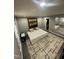 Bedroom with large rug and contemporary decor at 5809 Iris Lake Ct, Raleigh, NC 27604
