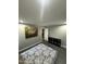 Bedroom featuring gray walls, laminate floors, and recessed lighting at 5809 Iris Lake Ct, Raleigh, NC 27604