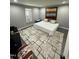 Bedroom with modern décor, large rug, and ample natural light at 5809 Iris Lake Ct, Raleigh, NC 27604