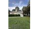 Charming single-story home with a well-manicured lawn and inviting front porch at 5809 Iris Lake Ct, Raleigh, NC 27604