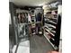 Walk-in closet with ample shelving and rod hanging space at 5809 Iris Lake Ct, Raleigh, NC 27604