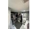 Spacious walk-in closet featuring ample storage, shelving, and stylish decor at 5809 Iris Lake Ct, Raleigh, NC 27604