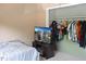 Bedroom featuring a bed, closet, and TV at 5810 Shady Grove Cir, Raleigh, NC 27609