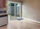 Bright dining area with wood floors and sliding glass doors to the backyard at 5810 Shady Grove Cir, Raleigh, NC 27609