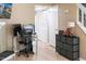 Functional office space featuring a desk, computer setup, and ample storage at 5810 Shady Grove Cir, Raleigh, NC 27609