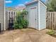 A blue shed providing additional storage space in the fenced backyard at 5810 Shady Grove Cir, Raleigh, NC 27609