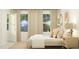 Comfortable bedroom with neutral tones, a large window, and stylish decor at 66 Digging Time Ave, Princeton, NC 27569