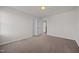 An empty bedroom features neutral carpet, a window, and neutral paint at 737 Botanical Ct, Bunnlevel, NC 28323