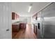 Efficient kitchen with stainless steel appliances, wood cabinets and access to a patio at 737 Botanical Ct, Bunnlevel, NC 28323