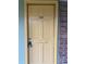 Exterior shot of apartment entrance door, painted in yellow, provides easy access to your space at 807 W Trinity Ave # 209, Durham, NC 27701