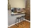 Kitchen bar features a stylish eat-in space with a view into the kitchen, perfect for casual dining at 807 W Trinity Ave # 209, Durham, NC 27701