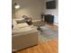 Relaxing living room showcases cozy seating, modern rug, and an entertainment setup at 807 W Trinity Ave # 209, Durham, NC 27701