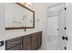 Stylish bathroom featuring a modern vanity, white countertop, and a shower at 8420 Bells Lake Rd, Apex, NC 27539