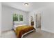 Bright bedroom with a bed and an ensuite bathroom at 8420 Bells Lake Rd, Apex, NC 27539