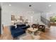 Open-concept home with hardwood floors and an open kitchen with modern features at 8420 Bells Lake Rd, Apex, NC 27539