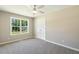 Bedroom featuring plush carpeting and a double-door closet at 86 Basswood Cir, Willow Springs, NC 27592