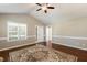 Spacious living room with vaulted ceiling, and hardwood floors providing a welcoming atmosphere at 86 Basswood Cir, Willow Springs, NC 27592