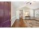 Bright living room with hardwood floors, natural light, and decorative rug accenting the space at 86 Basswood Cir, Willow Springs, NC 27592
