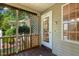 Relaxing screened-in porch with lattice screens providing privacy and shade at 86 Basswood Cir, Willow Springs, NC 27592