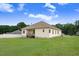 This well-maintained home has a spacious backyard and beautiful outdoor living space at 88 Longo Ln, Benson, NC 27504