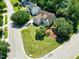 Expansive property with lush landscaping, mature trees, and a neatly manicured lawn at 917 Haddon Hall Dr, Apex, NC 27502