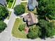 Real estate featuring lush landscaping, mature trees, and a private driveway at 917 Haddon Hall Dr, Apex, NC 27502
