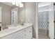 Bathroom features double sink vanity, with a full size shower and nice mirror at 917 Haddon Hall Dr, Apex, NC 27502