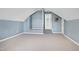 Bonus room showcasing neutral carpet, interesting ceiling line and open doorway at 917 Haddon Hall Dr, Apex, NC 27502