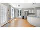 Breakfast nook with ample windows overlooking backyard, adjacent to an open kitchen layout at 917 Haddon Hall Dr, Apex, NC 27502