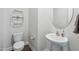 A simple bathroom with a toilet and sink at 933 Weatherby Ln, Creedmoor, NC 27522