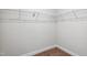 Walk-in closet with wire shelving and carpet flooring at 933 Weatherby Ln, Creedmoor, NC 27522