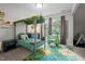 Charming bedroom with a leafy canopy bed, custom decor and furniture at 100 Redfoot Run Rd, Chapel Hill, NC 27516