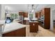 Modern kitchen with stainless steel appliances, white countertops, and custom cabinetry at 100 Redfoot Run Rd, Chapel Hill, NC 27516