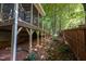 View of the backyard from under the home's porch at 100 Redfoot Run Rd, Chapel Hill, NC 27516