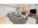 Cozy living room featuring a fireplace, hardwood floors, and lots of natural light at 101 Lochmere Forest Dr, Cary, NC 27518