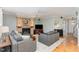 Comfortable living room featuring a fireplace, hardwood floors, and neutral color palette at 101 Lochmere Forest Dr, Cary, NC 27518