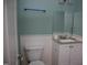 Cozy bathroom with a sink, toilet, and mirror at 103 Sara Dr, Nashville, NC 27856