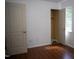 Bedroom featuring hardwood floors, a window, and a closet at 103 Sara Dr, Nashville, NC 27856