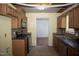 Functional kitchen featuring stainless steel appliances, wooden cabinets, and tile backsplash at 103 Sara Dr, Nashville, NC 27856