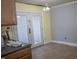 Bright kitchen with tile floors and stainless steel appliances at 103 Sara Dr, Nashville, NC 27856