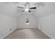 This bedroom features neutral walls, carpet flooring, ceiling fan and a window that offers natural light at 105 Greenbriar Ct, Chapel Hill, NC 27516