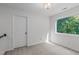 This bedroom features neutral walls, carpet flooring and a window that offers natural light at 105 Greenbriar Ct, Chapel Hill, NC 27516