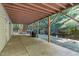The concrete patio offers outdoor space for relaxation and dining with easy access to the backyard at 105 Greenbriar Ct, Chapel Hill, NC 27516