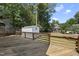 Spacious wooden back deck with a shed, perfect for outdoor entertaining and storage at 107 Roan Dr, Garner, NC 27529