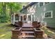Multi-level backyard deck with steps and integrated planter boxes at 10836 Wilmore Dr, Raleigh, NC 27614