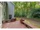 Spacious deck with integrated seating in a private backyard setting at 10836 Wilmore Dr, Raleigh, NC 27614