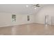 Bright bedroom with multiple windows providing natural light and light wood floors at 10836 Wilmore Dr, Raleigh, NC 27614