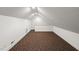 Bonus room with sloped ceilings and carpet at 10836 Wilmore Dr, Raleigh, NC 27614
