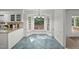 Charming breakfast nook featuring a bay window overlooking the backyard at 10836 Wilmore Dr, Raleigh, NC 27614