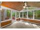 Inviting sunroom with wood ceiling and multiple windows overlooking greenery at 10836 Wilmore Dr, Raleigh, NC 27614